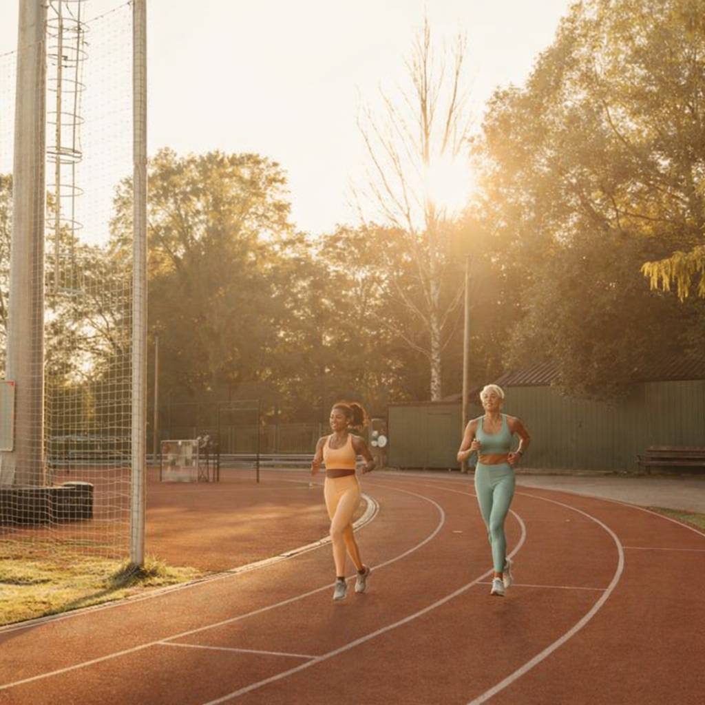 Two women in athletic wear enjoy