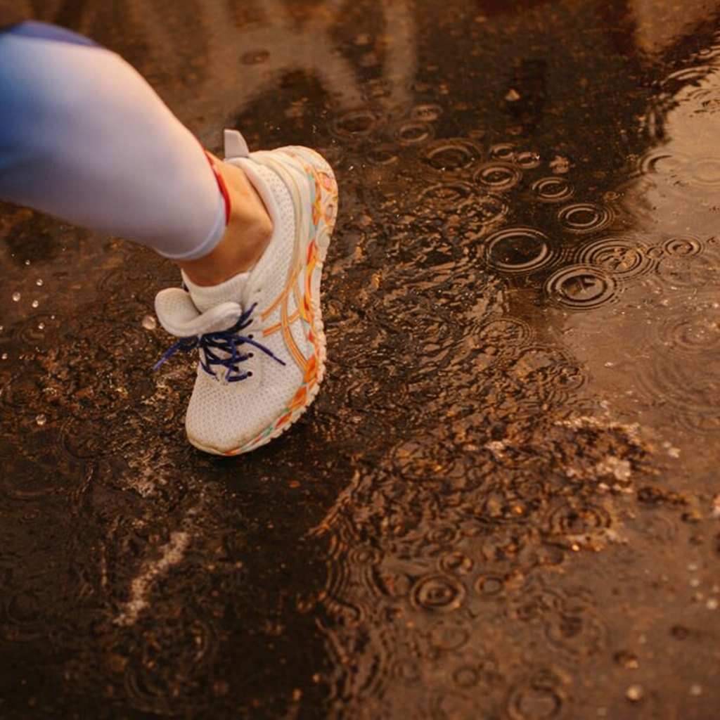 A white sneaker with colorful accents