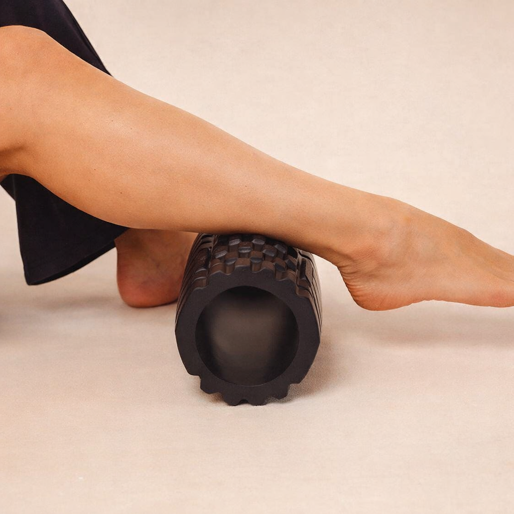 A person uses a black textured