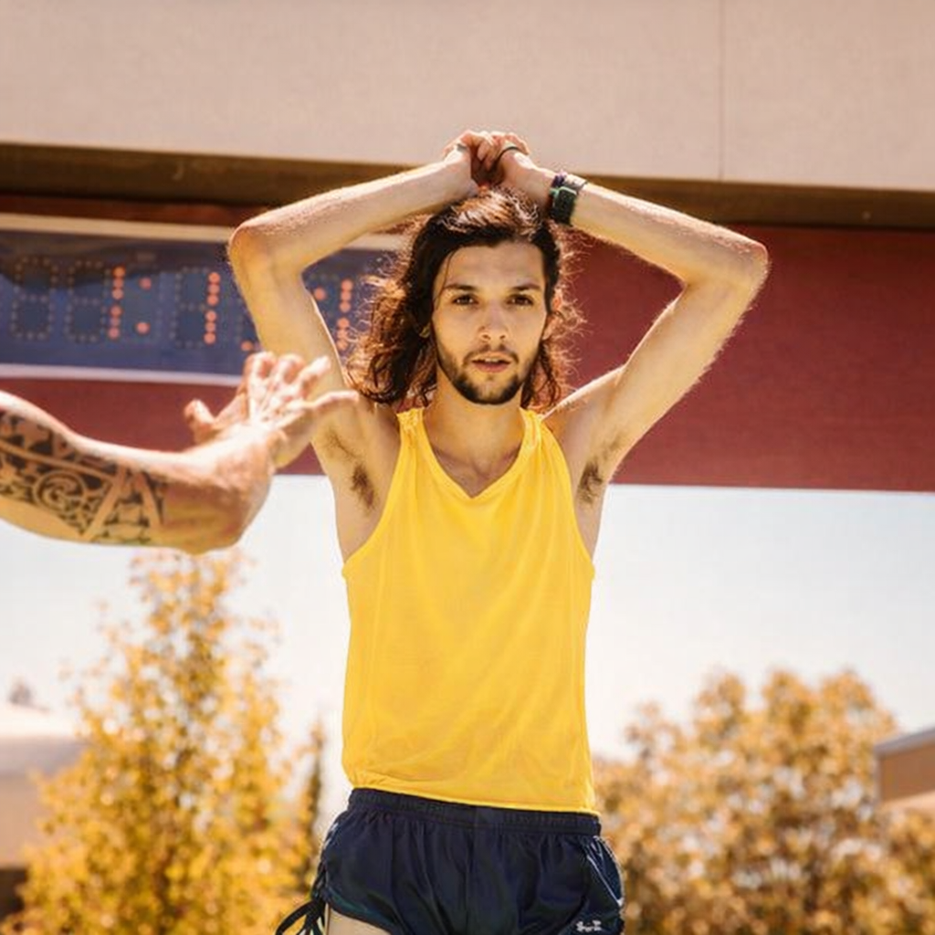 A focused runner with long hair